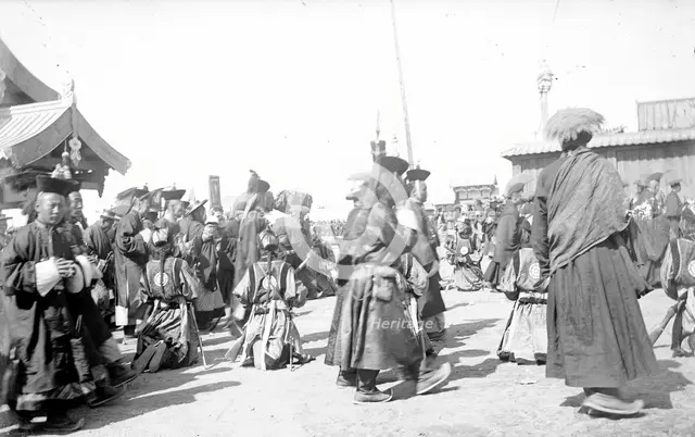 A group of Buddhist monks in the datsan, 1880.  Creator: Nikolai Nikolaevich Petrov.