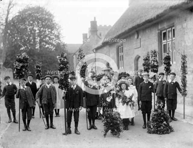 A group of children on May Day with May King and Queen centre right, Oxford, Oxfordshire, c1900. Artist: Henry Taunt