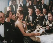 A Group of Fashionable Young People Sitting at a Table Drinking Champagne, 1924. Creator: British Pathe Ltd