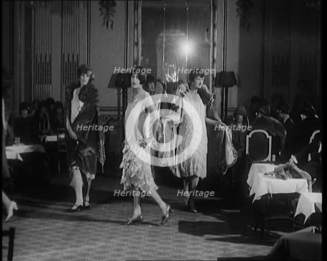 A Group of Female Civilians Modelling Various Glamorous Outfits in a Fashion Parade, 1920. Creator: British Pathe Ltd.