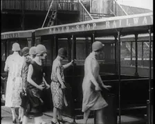 A Group of Female Civilians Board a Carriage of the Never Stop Railway 1924. Creator: British Pathe Ltd