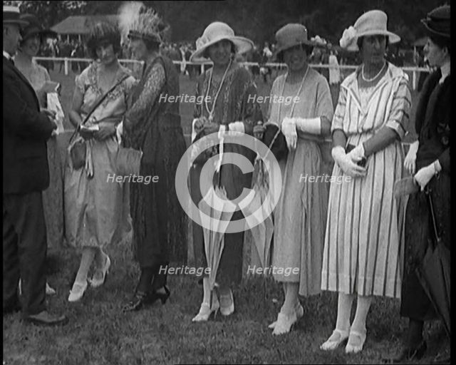 A Group of Female Civilians Dressed Glamorously at a Horse Racing Event, 1920. Creator: British Pathe Ltd.