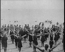 A Group of Female Civilians Exercising on a Beach, 1920. Creator: British Pathe Ltd