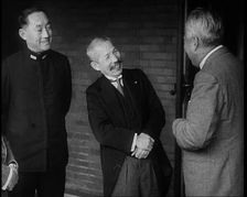 A Group of Four Male Japanese Politicians Talking Animatedly, 1937. Creator: British Pathe Ltd