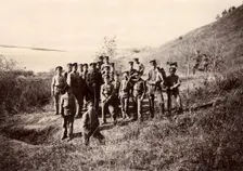 A group of Irkutsk high school students with a teacher on the bank of the river (Ushakovka), 1900. Creators: I. A. Podgorbunskii, V. I. Podgorbunskii