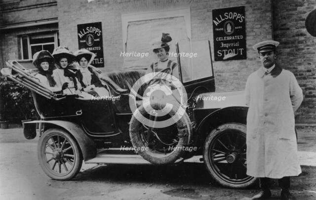 A group of ladies in a car, with their uniformed chauffeur, 1910. Artist: Unknown