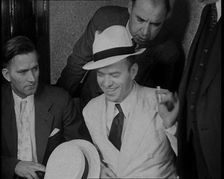A Group of Male American Civilians Dressed in a Gangster Fashion, 1930. Creator: British Pathe Ltd