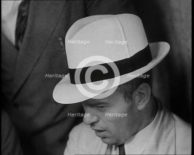 A Group of Male American Civilians Dressed in a Gangster Fashion, 1930. Creator: British Pathe Ltd.