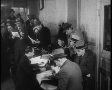 A Group of Male American Civilians in a Press Room, 1930s. Creator: British Pathe Ltd