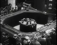 A Group of Male Children Looking at an Exhibit of a Model Railway at the British Empire..., 1924. Creator: British Pathe Ltd