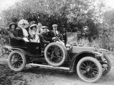 A group of men and women taking an outing in a 1907 Mercedes, 1908