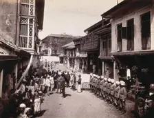 A group of officials making a visit to a house in Bombay, suspected of holding people with..., 1896. Creator: Unknown