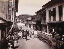 A group of officials making a visit to a house in Bombay, suspected of holding people with..., 1896. Creator: Unknown