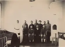 A group of people being treated in a hospital room, 1900. Creators: I. A. Podgorbunskii, V. I. Podgorbunskii