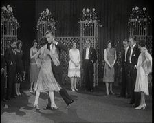 A Group of People Dancing the Charleston. One Female Civilian is Rubbing Her Legs is Pain, 1926. Creator: British Pathe Ltd