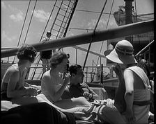 A Group of People on the Deck of a Cruise Liner at Sea, 1931. Creator: British Pathe Ltd
