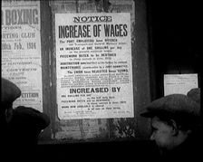 A Group of People Looking at a Sign. the Sign Reads Notice Increase of Wages 1924. Creator: British Pathe Ltd
