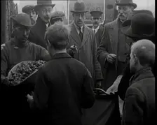 A Group of People Waiting To Receive a Measure of Coal, 1924. Creator: British Pathe Ltd