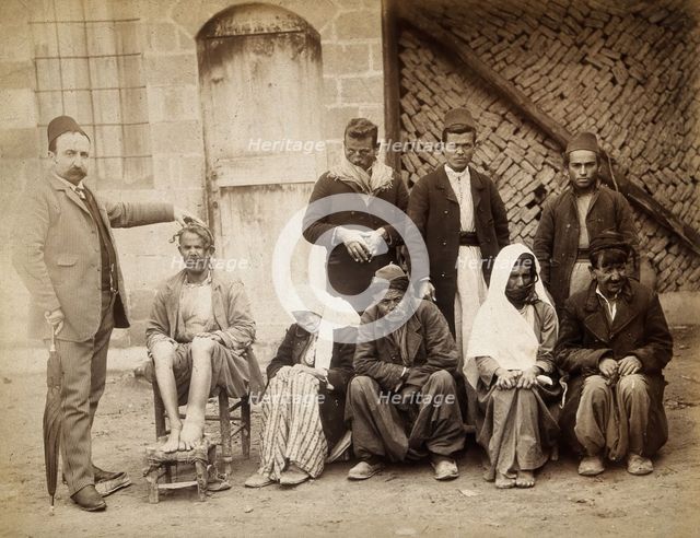 A group of people with leprosy in Jerusalem: a man in a striped suit..., c1890s. Creator: Unknown.