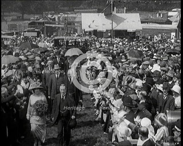 A Group of Politicians Walking Through a Large Crowd of People, 1920s. Creator: British Pathe Ltd.