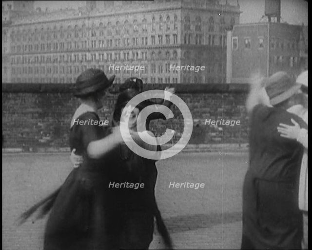 A Group of Plus Size Female Civilians Dancing on a Beach, 1920. Creator: British Pathe Ltd.