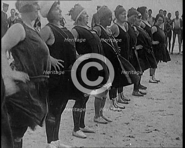 A Group of Plus Size Female Civilians Exercising on a Beach, 1920. Creator: British Pathe Ltd.