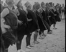 A Group of Plus Size Female Civilians Exercising on a Beach, 1920. Creator: British Pathe Ltd