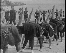 A Group of Plus Size Female Civilians Exercising on a Beach, 1920. Creator: British Pathe Ltd