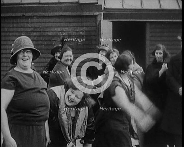 A Group of Plus Size Female Civilians Exercising on a Beach, 1920. Creator: British Pathe Ltd.