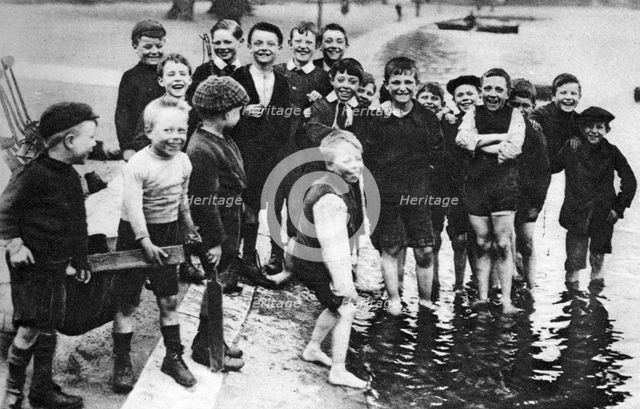 A group of summer paddlers in the Serpentine, London, 1926-1927. Artist: Unknown