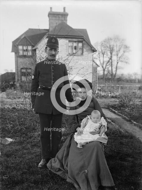 A group portrait of a policeman and his family, Warwickshire, 1905. Artist: A Newton
