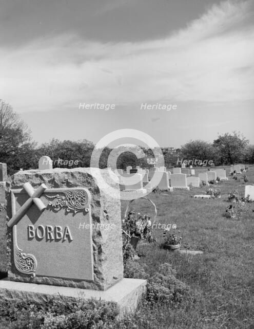 A graveyard at Gloucester which holds the remains of many of the..., Gloucester, Massachusetts, 1943 Creator: Gordon Parks.