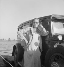 A grandmother from Oklahoma. She works in the California pea fields. Calipatria, California, 1939. Creator: Dorothea Lange