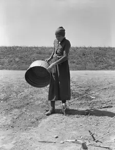 A grandmother in a migrant camp, Stanislaus County, California, 1939. Creator: Dorothea Lange