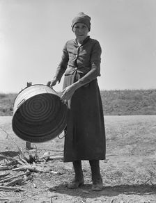 A grandmother in a contractor's camp, Stanislaus County, California, 1939. Creator: Dorothea Lange