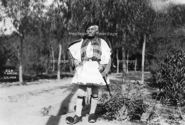 A Greek soldier in traditional uniform, c1920s-c1930s(?). Artist: Unknown