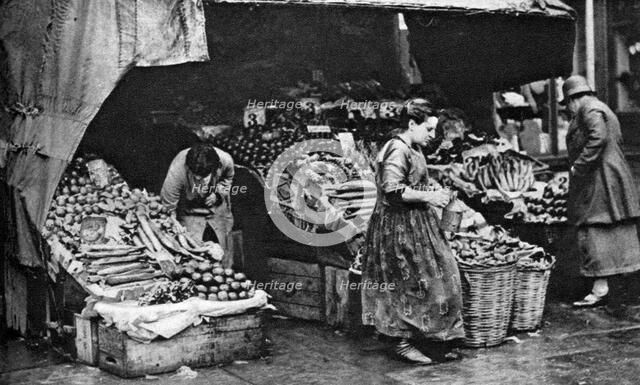 A greengrocer of the Commercial Road, London, 1926-1927. Artist: Unknown