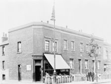 A greengrocer's shop on a street corner