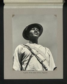 A gunner of the Sudan Artillery Regiment, 1964. Creators: Colonial Office, Unknown