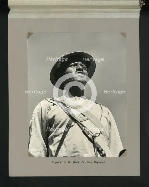 A gunner of the Sudan Artillery Regiment, 1964. Creators: Colonial Office, Unknown.