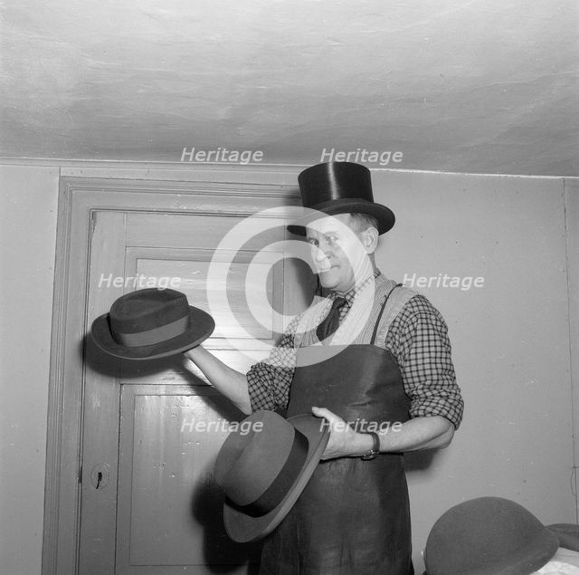 A hatter, Landskrona, Sweden, 1952. Creator: Unknown.