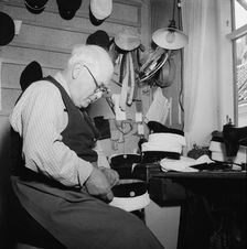 A hatter making a cap, Landskrona, Sweden, 1949