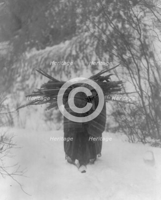 A heavy load, c1908. Creator: Edward Sheriff Curtis.