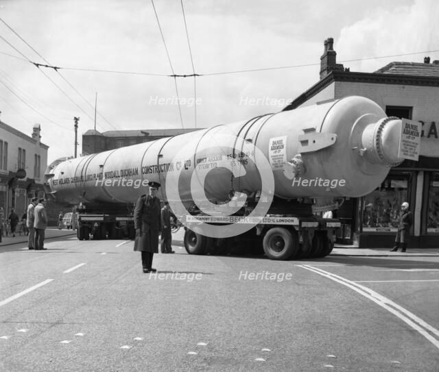 A heavy load stops the Manchester traffic, 1962.  Artist: Michael Walters