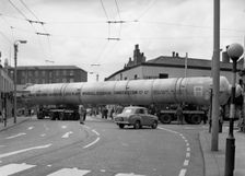 A heavy load stops the Manchester traffic, 1962. Creator: Michael Walters