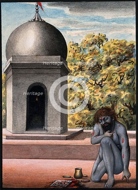 A Hindu ascetic or holy man, performing austerities outside a temple (?), 1880. Creator: Unknown.