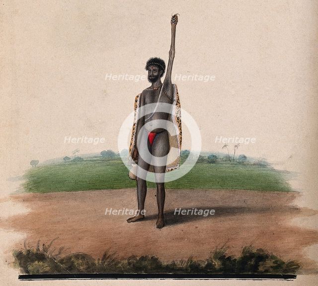 A Hindu ascetic or holy man: standing, with withered left arm raised over his head, and..., 1880. Creator: Unknown.