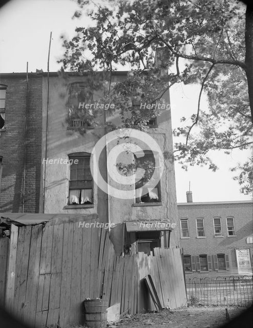 A home on Seaton Road in the Northwest area, Washington, D.C., 1942. Creator: Gordon Parks.