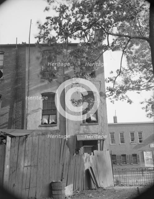 A home on Seaton Road in the Northwest area, Washington, D.C., 1942. Creator: Gordon Parks.