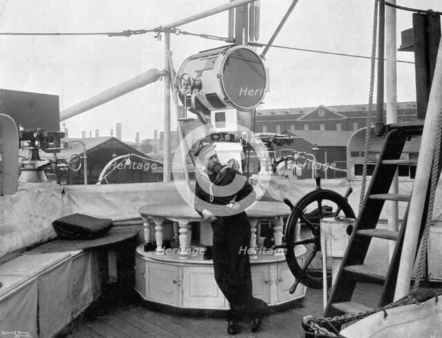 A holophote on board HMS 'Imperieuse', 1896. Artist: A Debenham